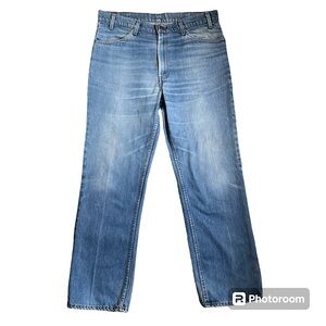 Vtg Orange Tag Levi’s Jeans 40519 0913, medium fade wash, actual size 37x31